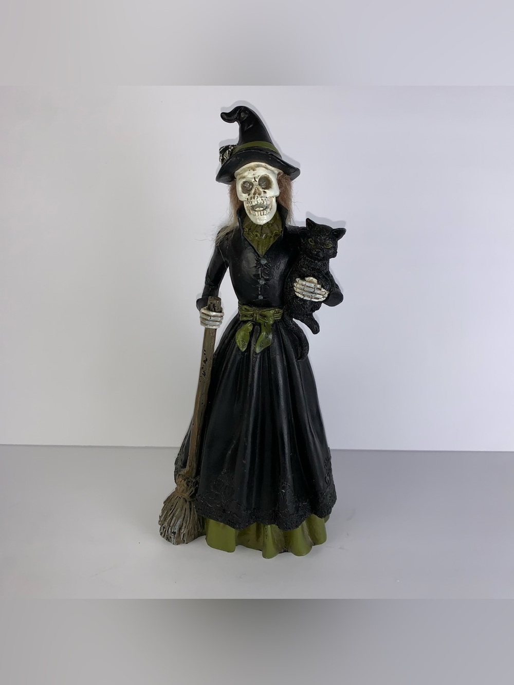 Skeletal witch with light up eyes figurine halloween home decor 12"